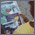 Crian�a observa material doado